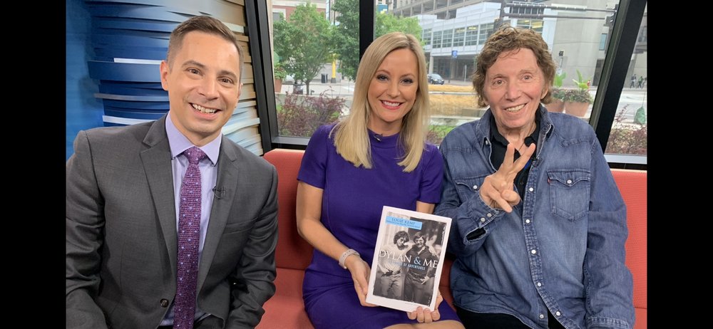  Mike Augustyniak,  Jennifer Mayerle  and Louie Kemp with Dylan &amp; Me: 50 Years Of Adventures Book  WCCO | CBS Minnesota  August 10th, 2019 / Photo by  Marc Percansky      