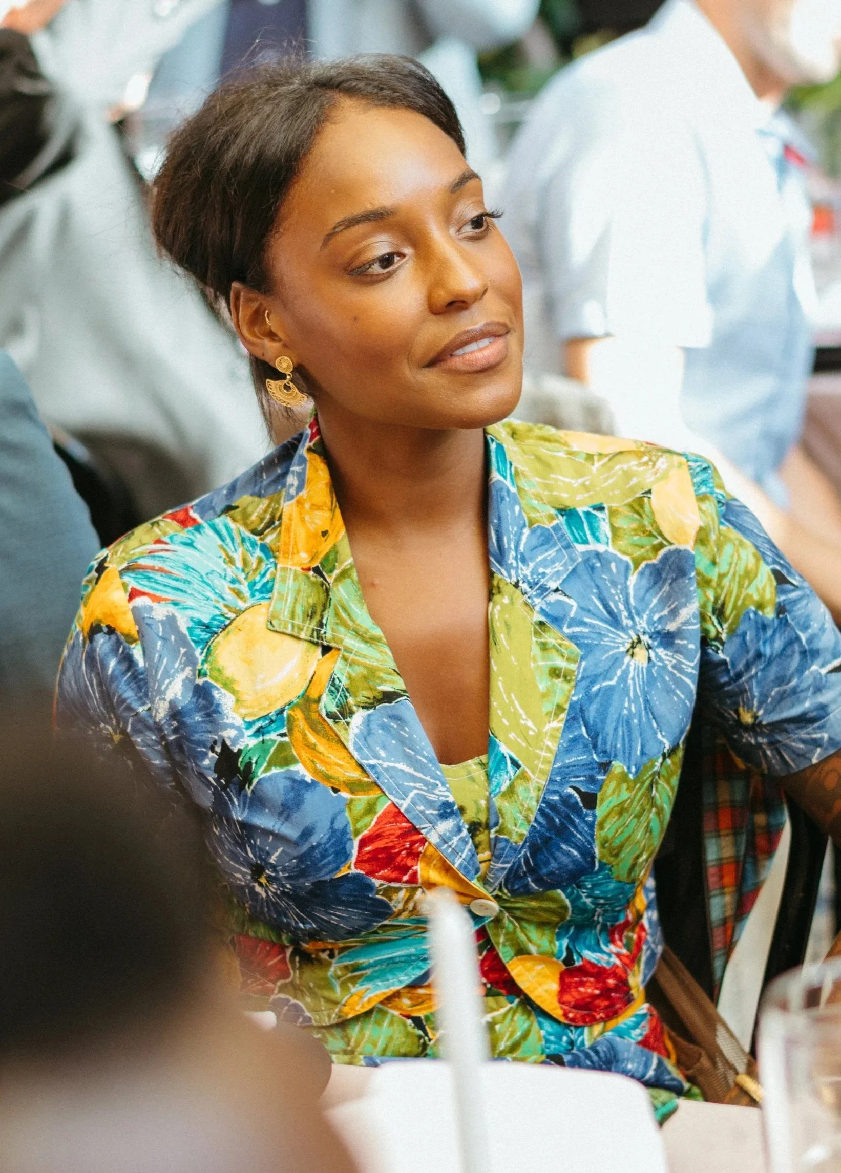 Woman pays close attention to speeches at her friend's Northern California wedding.