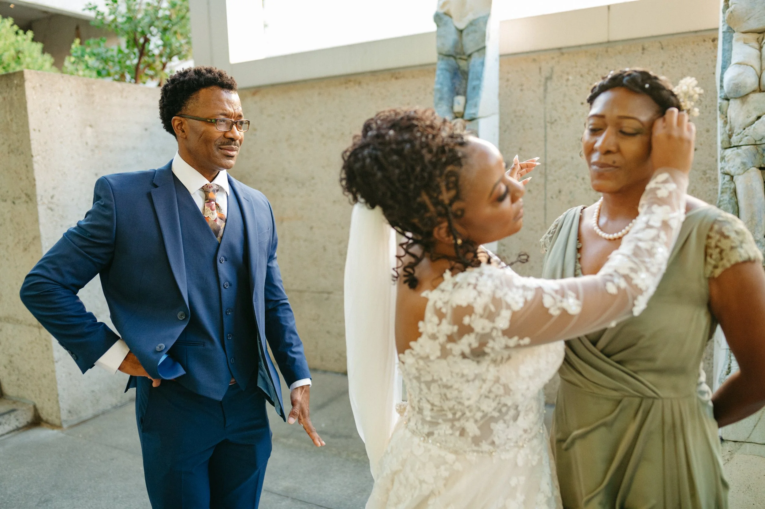 Documentary wedding photograph by Amira Maxwell, focused on emotion, light, and gesture.