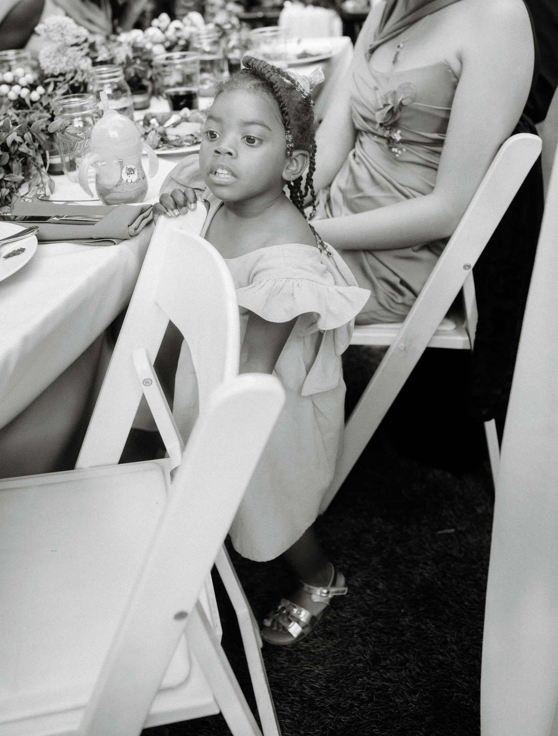 young guest caught in a natural moment during a Bay Area wedding reception.