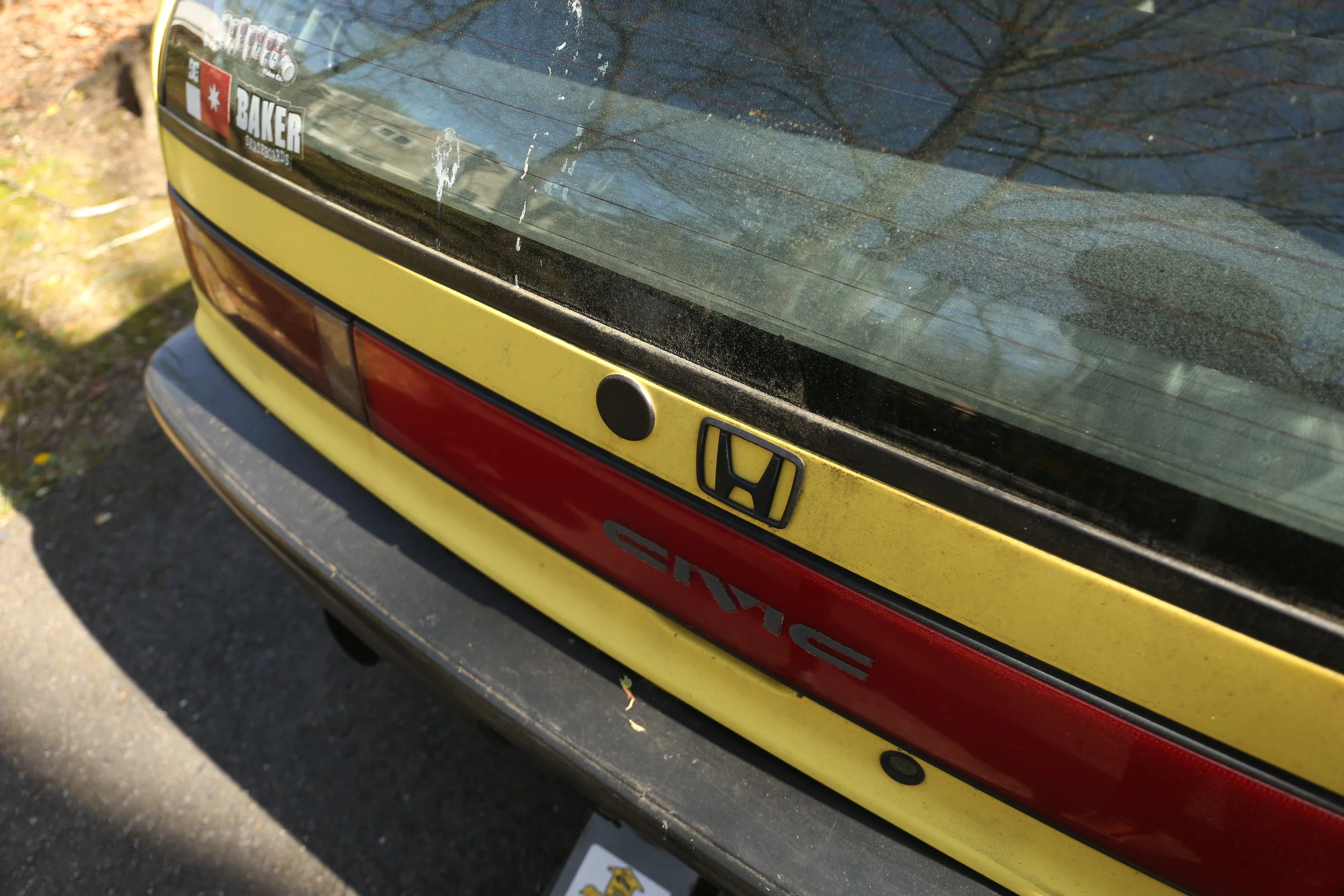 I plastidipped over the gloss white plastic finish to match my Honda logo.
