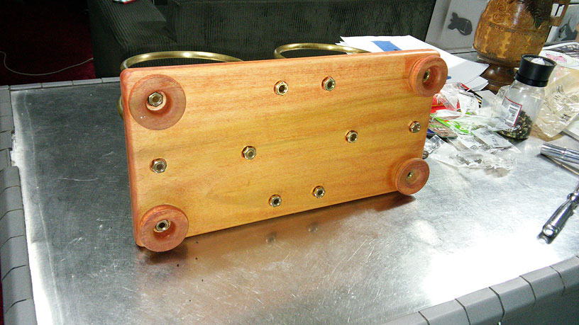The same record holder repaired with new wood and a Cherry Danish oil finish and a lot of "elbow grease".