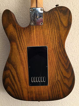 Custom stain technique with black acrylic, various shades of Amber dye stain and polyurethane. 
