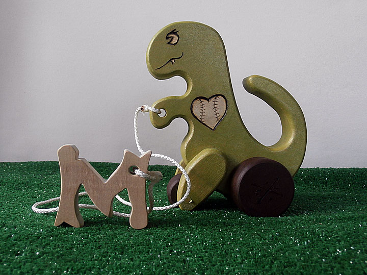 Pull dino for baby M of the baseball loving family.