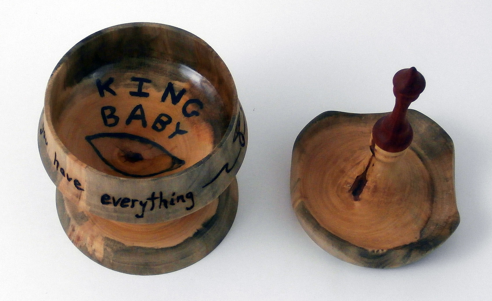 One-of-a-kind Roky Erickson tribute. Unique Cottonwood vessel wood burnt with lyrics "If you have ghosts then you have everything". Rocky Erickson vessel says King Baby on the inside and is coated with food safe epoxy.