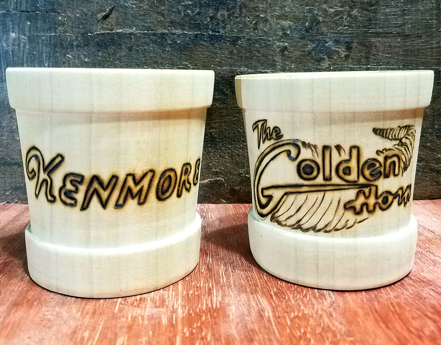 Poplar wood shot glass set, wood burnt with decorations representing the bars in the movie, Barfly , based the life of poet Charles Bukowski.