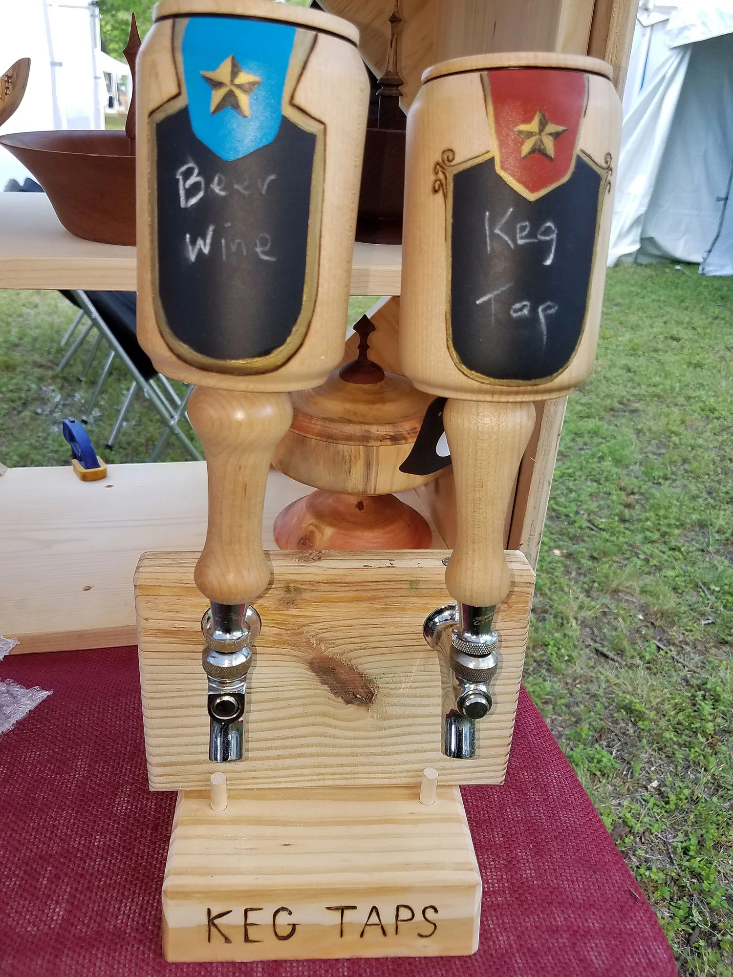 Beer taps made of Hard Maple wood. Including a chalkboard painted area for labeling the type of beer or wine currently in the keg.