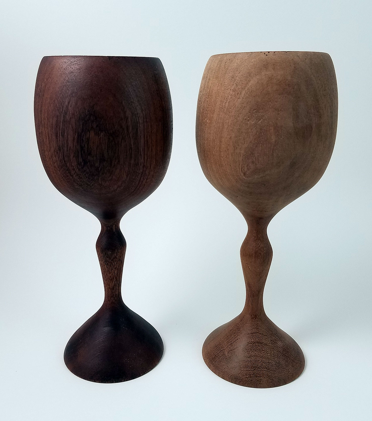 These two Sapele wood wine goblets are the same! The one on the right just hasn't had a finish applied yet. A little natural oil to lubricate the wood goes a long way!
