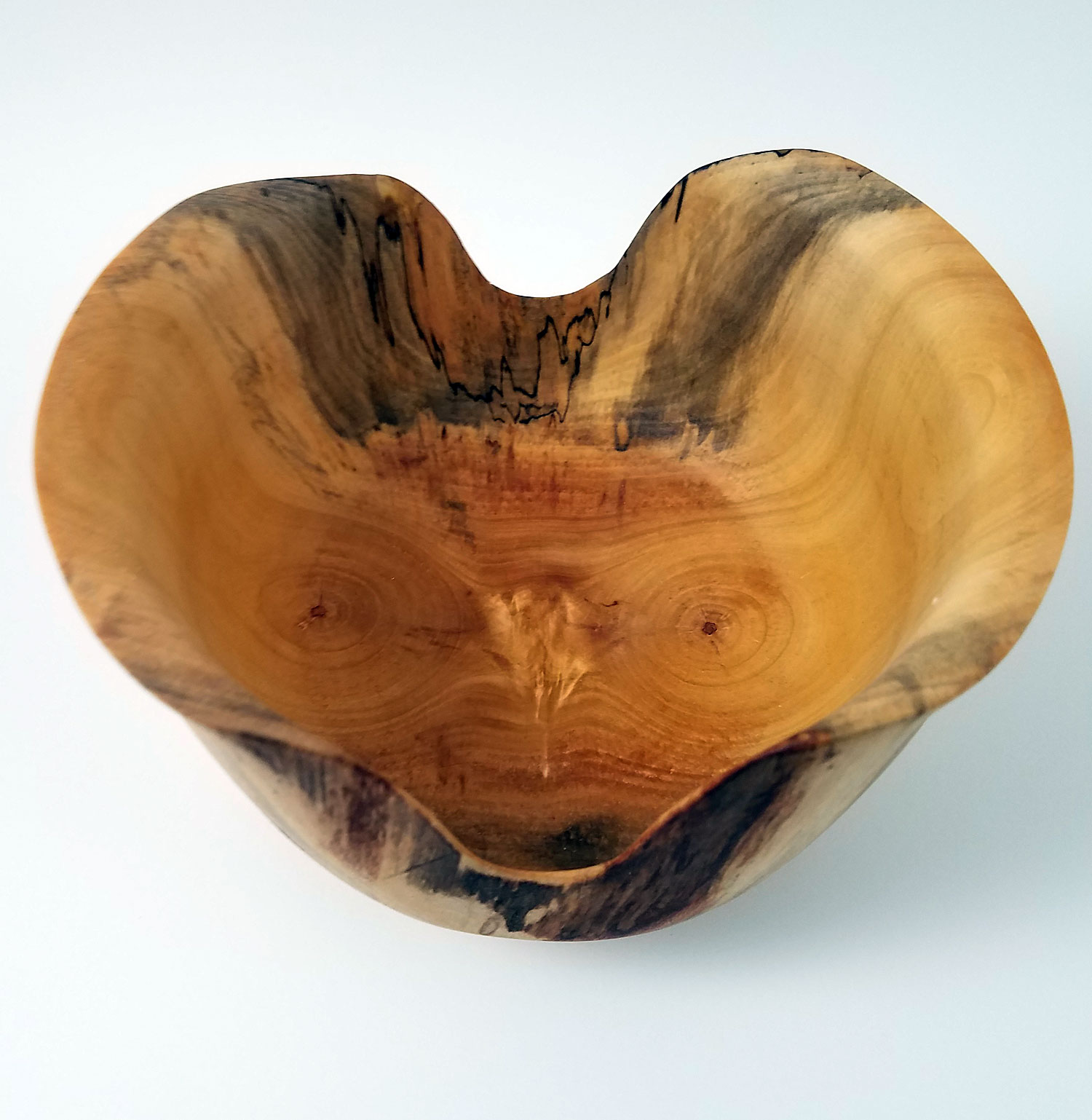 The owl eyes and nose in the grain of the wood were really prominent in this one.