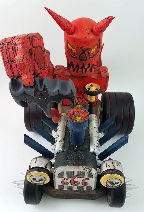 Our love of Ed Roth's Rat Fink and hot rods came to life in this little devil.
