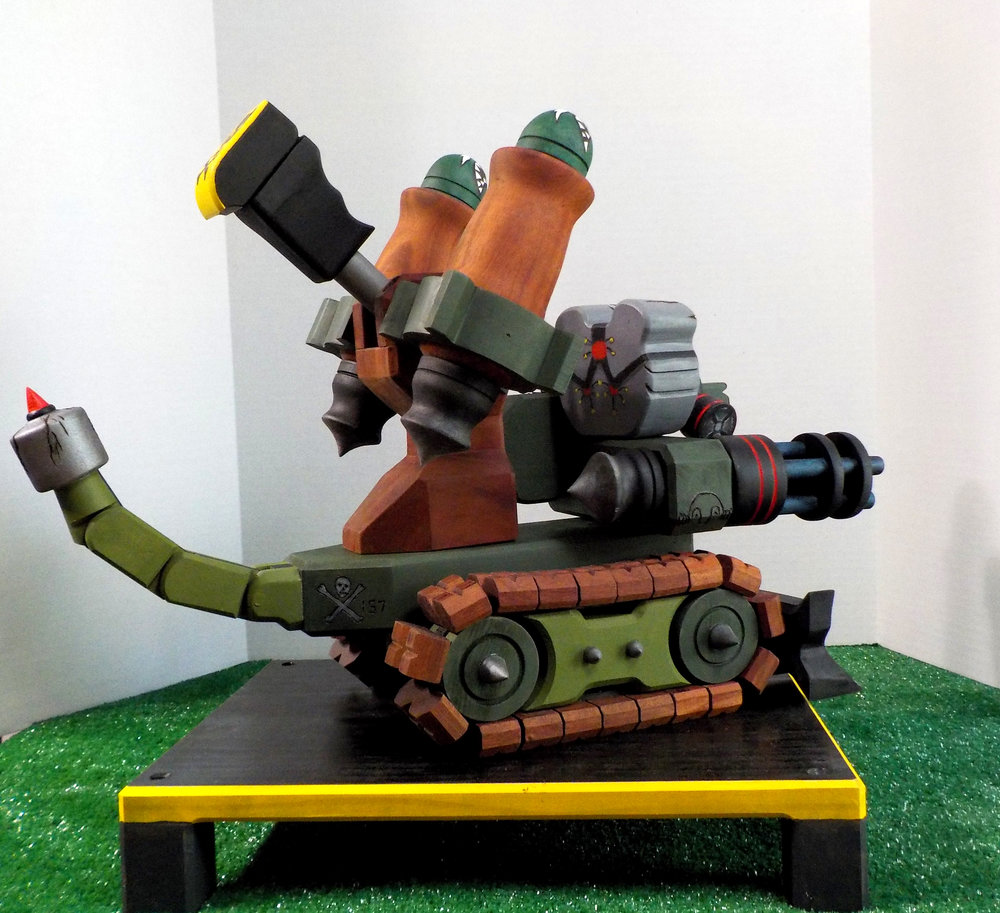 Death Crusher is adorned with lots of detail. Including a small wood burnt Kilroy.