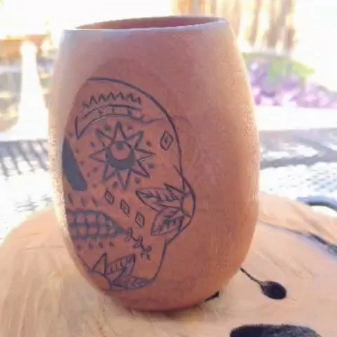 Getting in the Halloween and D&iacute;a de Los Muertos spirit! With a little pyrography drawing on the sides of this lovely mahogany vessel. Wanted to share it because I'm very happy with how it turned out! 

#pyrographyart #ChaosWoods #d&iacute;adel