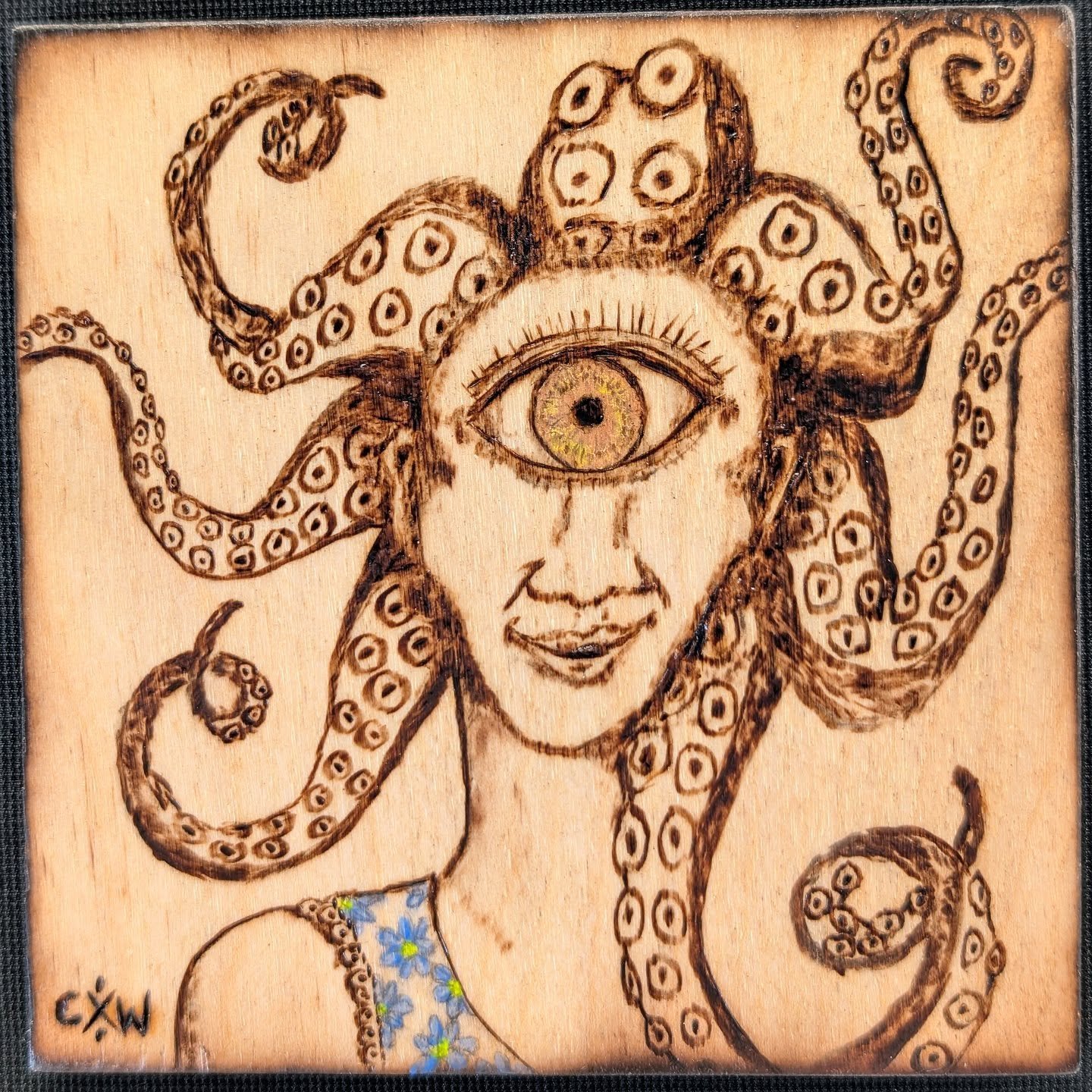 Medusa Cyclops Octopus Lady - small 4"x4" pyrography drawing with acrylic paint highlights we're sending to @nvfinearts for their open call. Ship them your art to help fill their space in Feb and March with 4x4 pieces. Or stop by if you're 