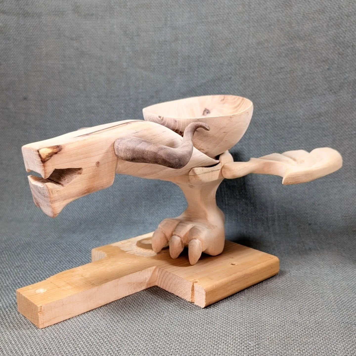 Finally making progress on the Dragon cup! Still a long ways to go but it's looking pretty awesome.

#dragon #woodcarving #handmade