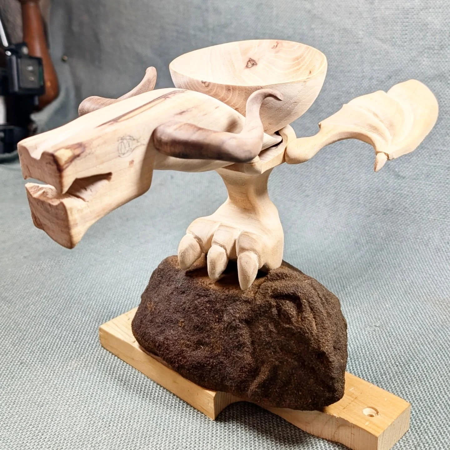 Pretty obsessed with this guy. It's cool getting to mount him to a piece of limestone Sarah practiced carving on in high school. Next is stain and paint.

#woodcarving #woodsculpture #dragon #handmade #woodart