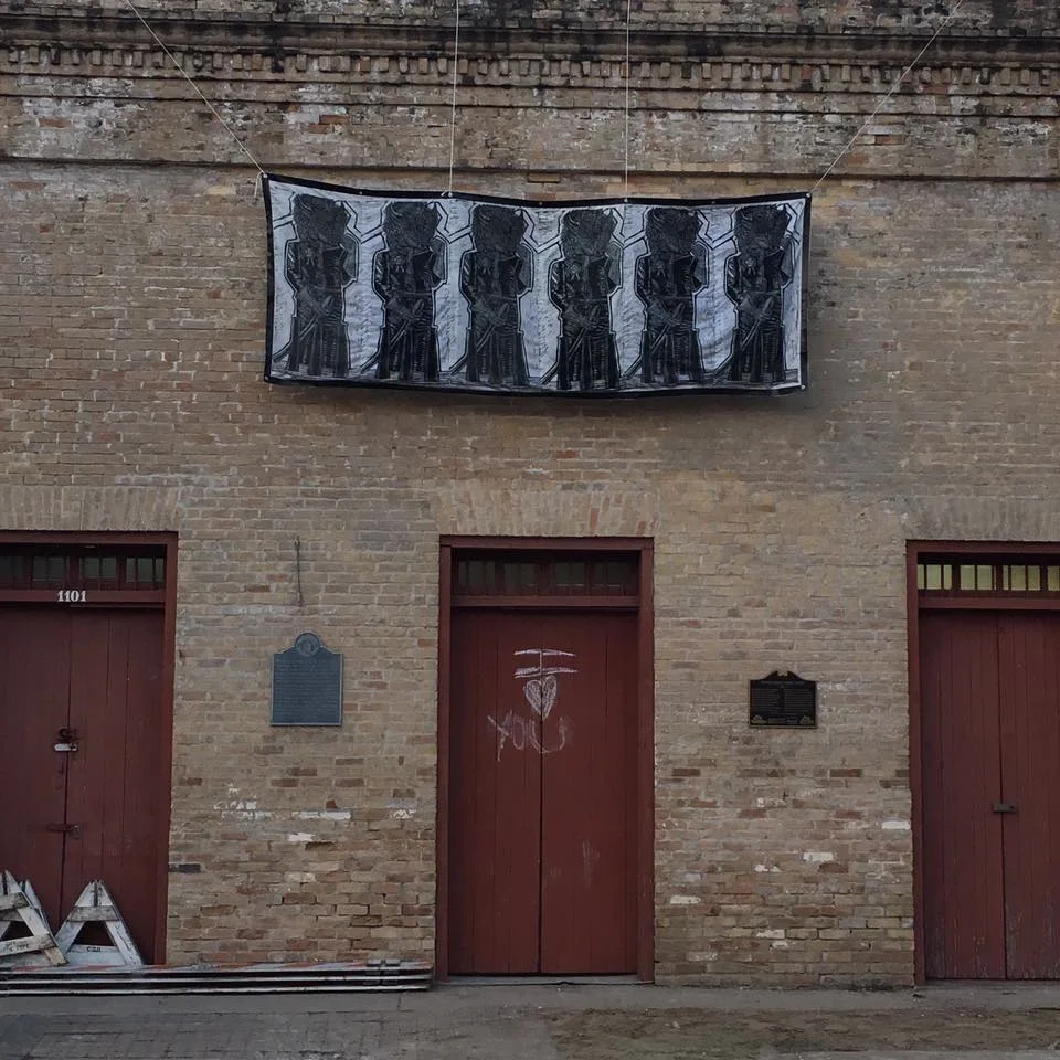 Buffalo Soldiers Prints installed on public building in downtown Brownsville.
