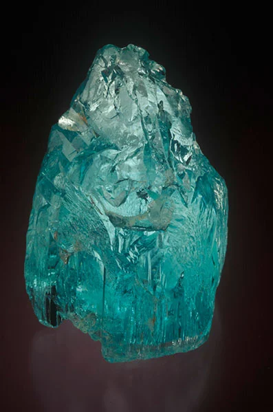 Natural crystal of gem quality aquamarine from Mozambique. Old H Bank specimen now in the William Larson Collection.