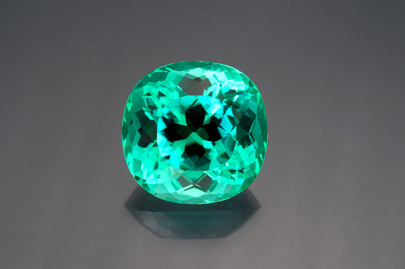  Paraiba-type tourmaline from Mozambique, 70.74 carats, cushion cut, 25.05 x 24.68 x 18.38 mm. 