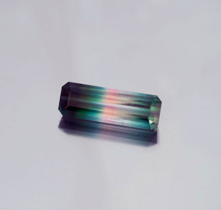 Count the colors. Rare multi-colored Brazilian beauty, 10.59 ct, 24 x 8 x 6 mm. (Photo: Mia Dixon)