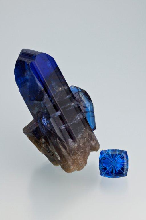 Tanzanite , one of East Africa’s most notable gems, is a form of the mineral zoisite. Discovered in 1967, it is only found in Tanzania. Tanzanite crystal specimen courtesy of Evan Caplan, and the faceted tanzanite, 10.22 carats is courtesy of John Dyer & Co. (Photo: Robert Weldon, © GIA 2012)
