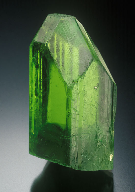 Peridot crystal from Mogok, 4.3 cm high. Bill Larson Collection. (Photo: Jeff Scovil)