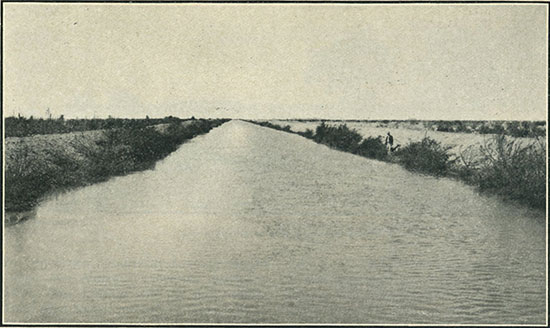 An irrigation canal, San Diego County; canals like these make fertile thousands of hitherto uncultivated acres. (Photo: Putnam & Valentine)