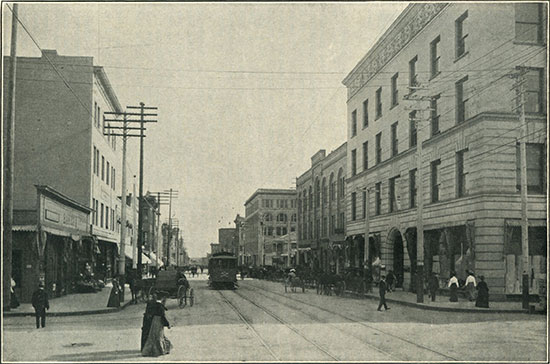 Fifth Street, one of San Diego’s principal business thoroughfares, looking west toward the harbor. Note the substantial buildings, the electric cars, and other evidences of a progressive city.
