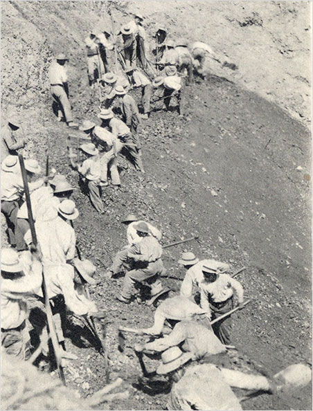 Working on hillside.