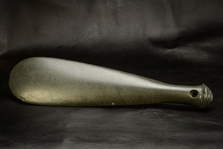Mere club. This nephrite club, pronounced "meh-reh" by the Maori—the indigenous of New Zealand—, has a beautifully carved butt, which would have aided in its handling. Such clubs are typically 10 to 20 inches in length; like the hei-tiki , the mere is considered to possess a spiritual quality, and are passed from generation to generation. In combat, the club was used with a jabbing, thrustiing motion rather than swinging. From the collection of Pala International's Bill Larson. (Photo: Mia Dixon)