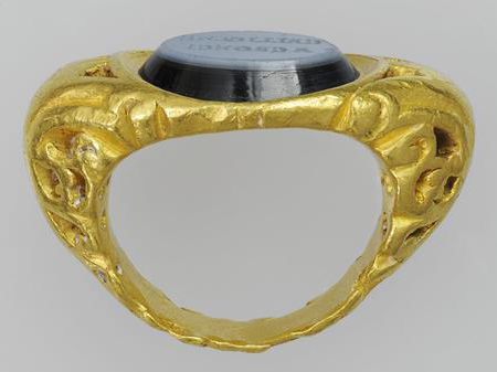 Ring with an Inscription , 100–300 C.E., Roman. Gold and nicolo (a type of onyx used for engraving). Object (ring): H: 1.6 x L: 3.2 cm (5/8 x 1 1/4 in). Object (intaglio): H: 1.2 x L: 1.6 cm (1/2 x 5/8 in). Bibliothèque nationale de France, Département des monnaies, médailles et antiques, Paris.