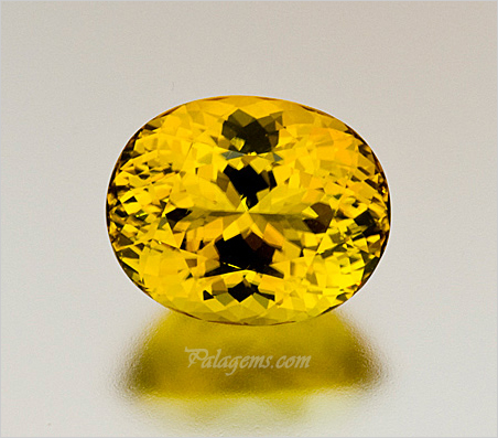 Golden tourmaline from Mozambique , 11.19 carats, 15.01 x 12.08 x 9.31 mm. (Photo: Jason Stephenson)