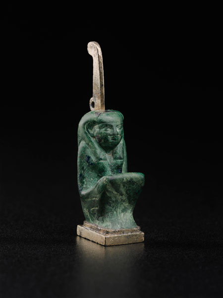 Arbiter. Amulet of Maat, 743–712 BCE. Gilded silver and malachite. Harvard University—Boston Museum of Fine Arts Expedition* Photograph © Museum of Fine Arts, Boston