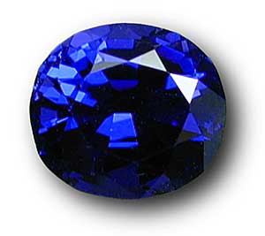 Spinel colored by cobalt is one of the delights of the gem kingdom. Above is a particularly fine example. ( Photo: John McLean ; Stone: Dr. Richard Bartholomeau)