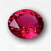 This 1.73-ct. red spinel from Burma displays the intense crimson that has made spinel second only to ruby in the pantheon of red gems. Ask for Inventory #2405. ( Photo: John McLean ; Gem: Pala International)