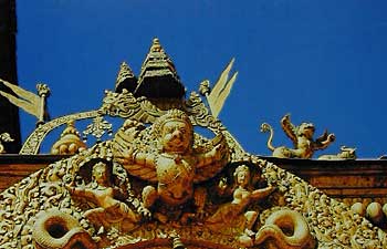 Figure 2. An incredibly deep blue sky contrasts greatly with an ornate brass and gold carving in the Kathmandu Valley of Nepal. This photo was taken in November, 1988, at approximately 3:00 PM. The blueness of the skylight can be attributed largely to the lack of dust and moisture in the atmosphere. Photo: Richard W. Hughes