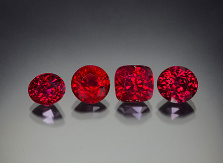 Four untreated rubies from the new find in Madagascar, ranging in size from 4.0 to 6.5 ct. As can be seen, the new production is extremely gemmy. Most gems fell into the Lotus Gemology proprietary "Royal Red" color type . (Photo: Wimon Manorotkul/Lotus Gemology)