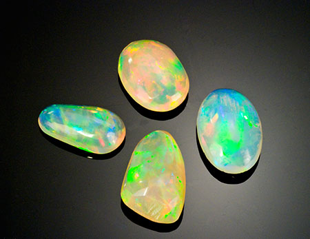 No smoking. An array of Ethiopian white opals, Pala International's featured stones for March 2012. (Photo: Mia Dixon)