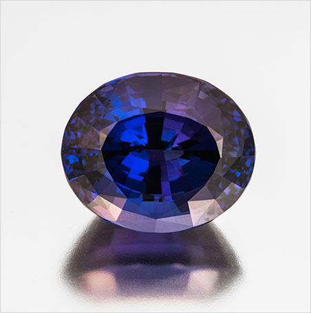 Blue Christmas? Oval cut tanzanite, 45.10 carats, 22.57 x 18.69 x 15.44 mm, heated. Inventory #362 . This stone was custom-cut by Bernd Cullman, Idar-Oberstein, Germany. (Photo: Mia Dixon)