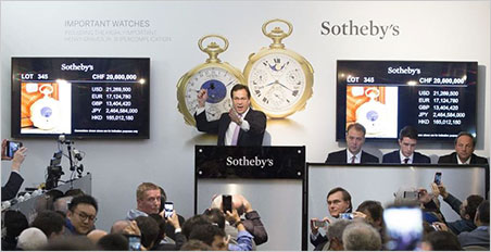 Do I hear 25 complication—er—million? Tim Bourne auctioneering the Henry Graves Supercomplication on November 11. (Photo: Sotheby's news release)