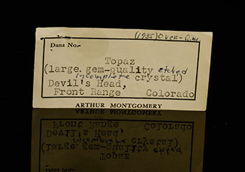Paper trail. The labels for the topaz indicate 1) discovery—(1935) Over – Q.M., 2) retention—Arthur Montgomery Collection, 3) gift—to U.S. National Museum and 4) cutting by Meg Berry. (Photos: Mia Dixon)