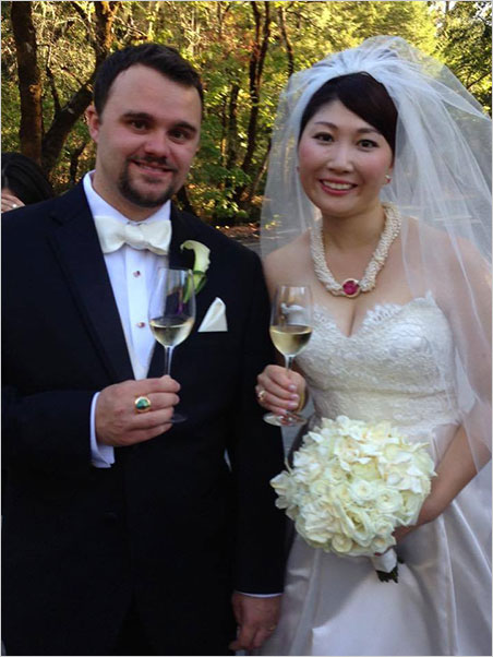 Cheers. What would a Larson wedding be without beverages and bijoux? Rika wears a Tourmaline Queen Mine rubellite and pearl necklace while Will sports a rainbow garnet ring. (Photo: Jeanne Larson)
