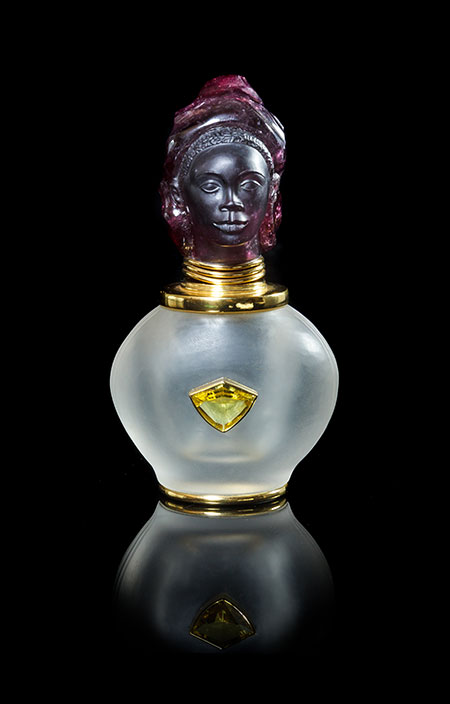 A rubellite, rock quartz crystal, 18 karat yellow gold and citrine scent bottle, Emil Becker, Madagascar, height: 10.2 cm. (Photo courtesy of Leslie Hindman Auctioneers)
