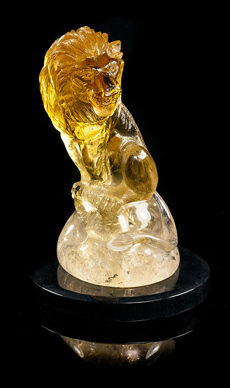 A citrine carving of a lion, Gerhard Becker, Idar-Oberstein, Germany, 7 x 4.5 x 4.5 in. (Photo courtesy of Leslie Hindman Auctioneers)