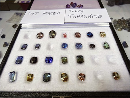 Au naturel. Some unheated colorful tanzanite faceted gemstones. They come in all colors, the pink and purple ones being the rarest. Seen at Valerio Zancanella's booth. (Photo: Eloïse Gaillou)