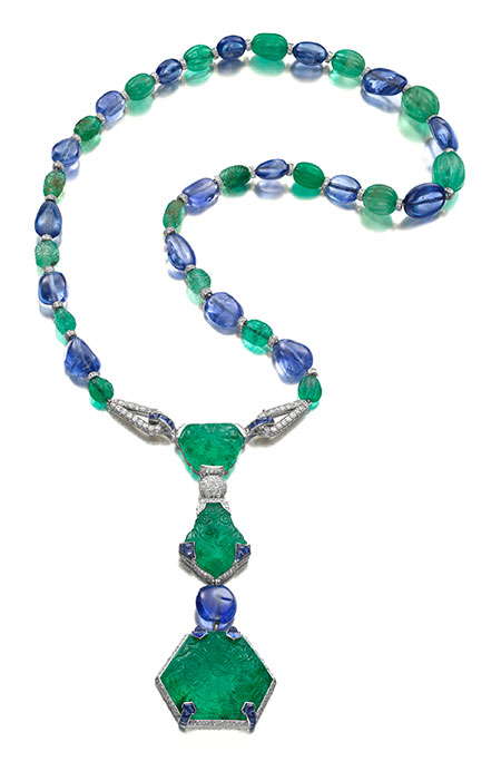 The Timken necklace. Designed by Cartier, Paris in 1925—the spring-time of art deco—belonged to Lilian S. Timken, whose husband, William, was one of the founders of the Timken roller-bearing company in Canton, Ohio. They lived in a 24-room apartment on Fifth Avenue, New York and amassed a highly significant art collection as well as some dazzling pieces of jewelry by the top houses. This emerald, sapphire and diamond necklace is one of the most important examples of Cartier jewelry from the 1920s. It includes three rare Mughal emeralds carved with floral designs on the front and reverse weighing 71.91 carats, 30.27 carats and 29.21 carats, there are 18 sapphire beads, 34 buff-top cabochon sapphires, 18 emerald beads and 652 diamonds. (Photo: Siegelson, New York)