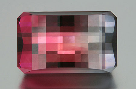 An example of inventive faceting: a bicolor tourmaline cut by J. L. White Fine Gemstones. (Photo: Jeff White)