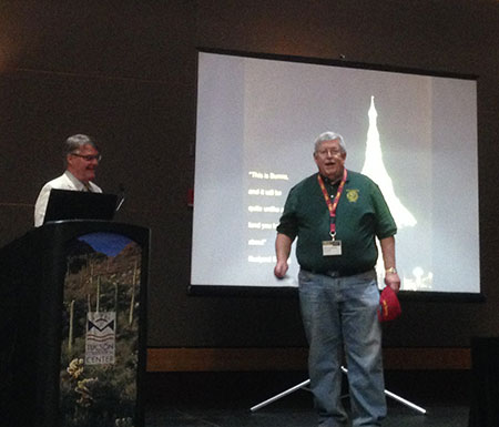 Warming up the crowd. Paul S. Harter, right, prominent mineral collector and chair of the 60th Tucson Gem and Mineral Show, introduces Bill Larson before Bill's Valentine's Day presentation on "The Gem and Crystal treasures of the mythical Valley of Mogok." (Photo: Will Larson)