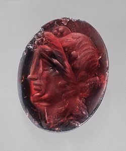 Gem no. 8 is a Ptolemaic oval intaglio (16.0 x 13.0 mm) engraved with the head of Dionysos wearing an ivy wreath (late 2nd–1st century BCE). Inv. no. 85.AN.444.22 (gift of Jonathan H. Kagan), J. Paul Getty Museum, Villa Collection. (Photo: Harold and Erica Van Pelt)