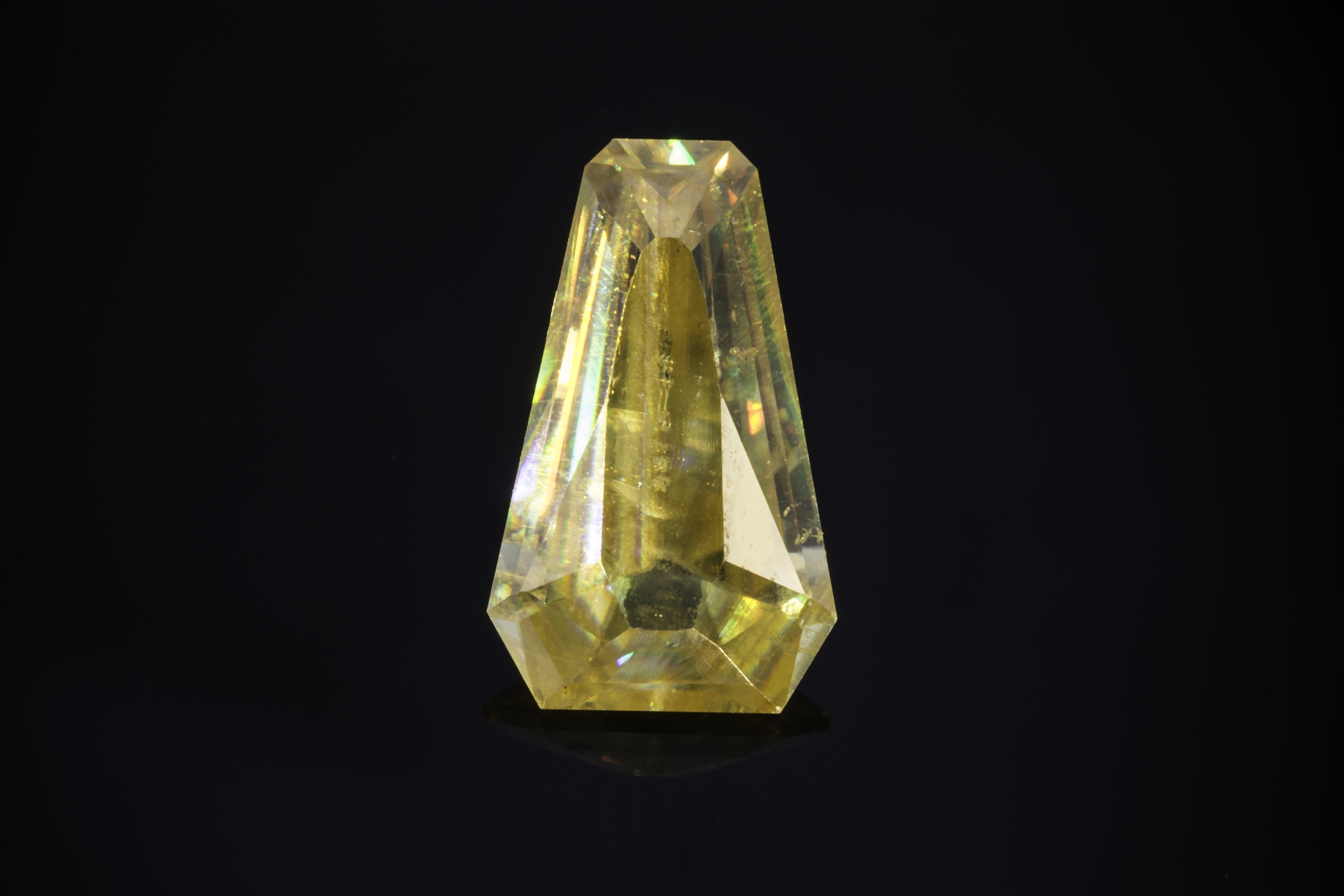 Wulfenite from Namibia , 5.95 carats, 13.35 x 8.15 x 3.95 mm. Inventory # 22841 . (Photo: Mia Dixon)