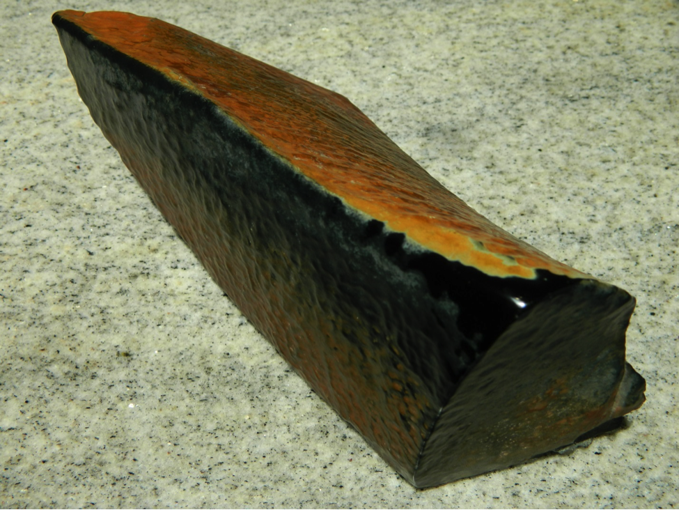 Here is an 8-lb piece of partially slicked and hand-polished, very good black jade found by Elvie Parker from Casper, Wyoming. Most folks believe this is from the famous Edward's black claim found in the early 1960s.